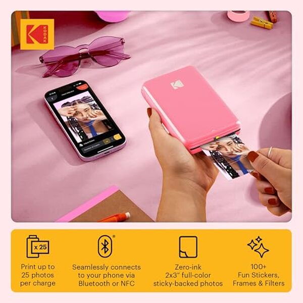 Découvrez notre test complet de l'imprimante photo mobile Kodak Step en kit de voyage rose : caractéristiques, performances et avis pour des photos instantanées en déplacement.